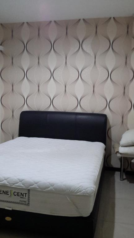 Budget Guest House Tunas Mandiri Jaya Malang Pokoj fotografie
