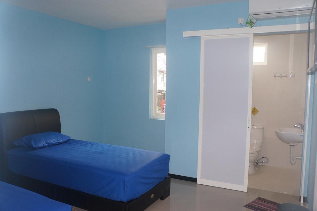 Budget Guest House Tunas Mandiri Jaya Malang Pokoj fotografie