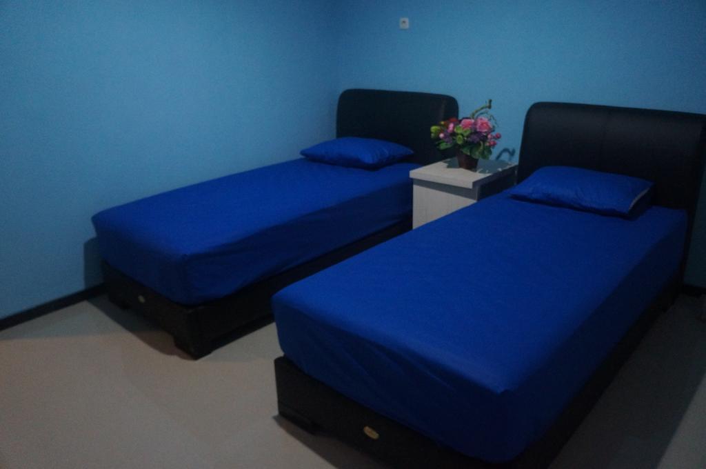 Budget Guest House Tunas Mandiri Jaya Malang Pokoj fotografie